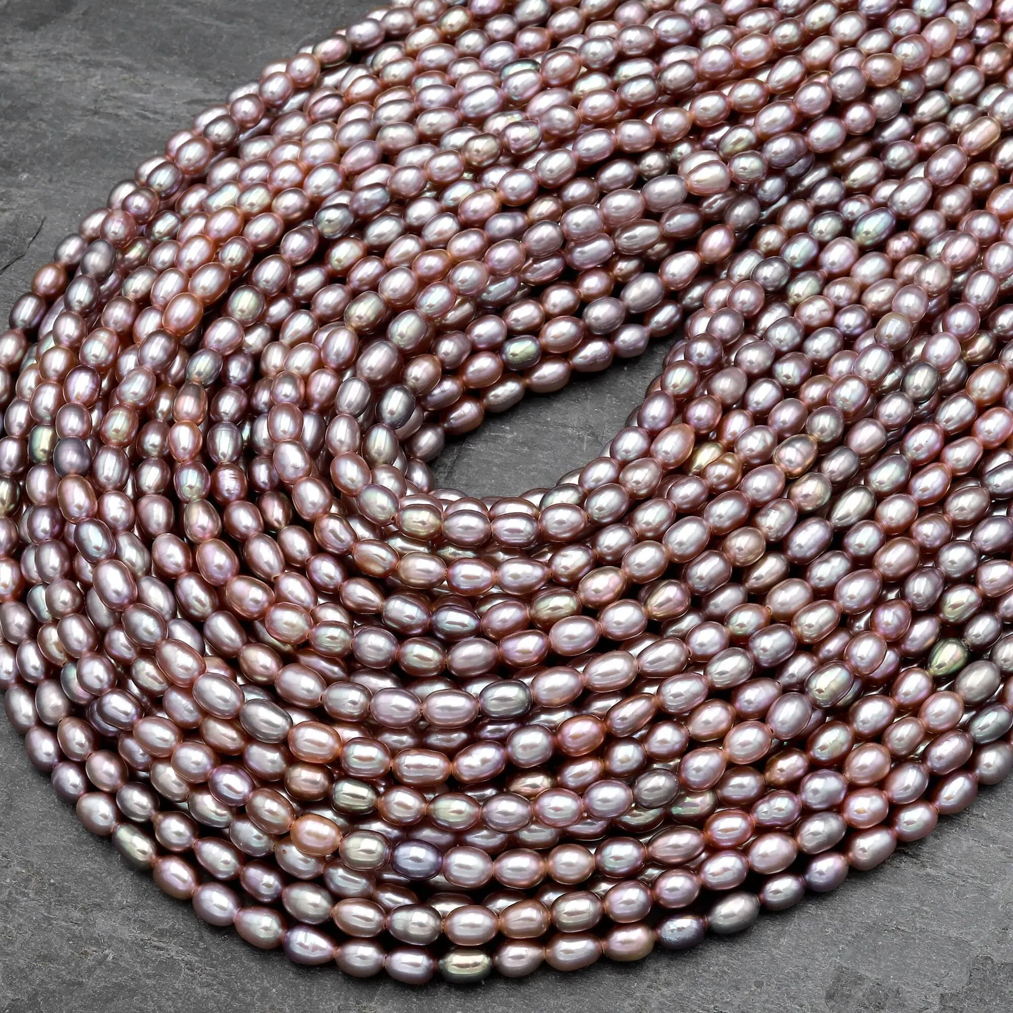 AAA Genuine Freshwater Natural Metallic Mauve Pink Purple Pearl Oval Rice Shape Iridescent High Luster Pearl 16" Strand