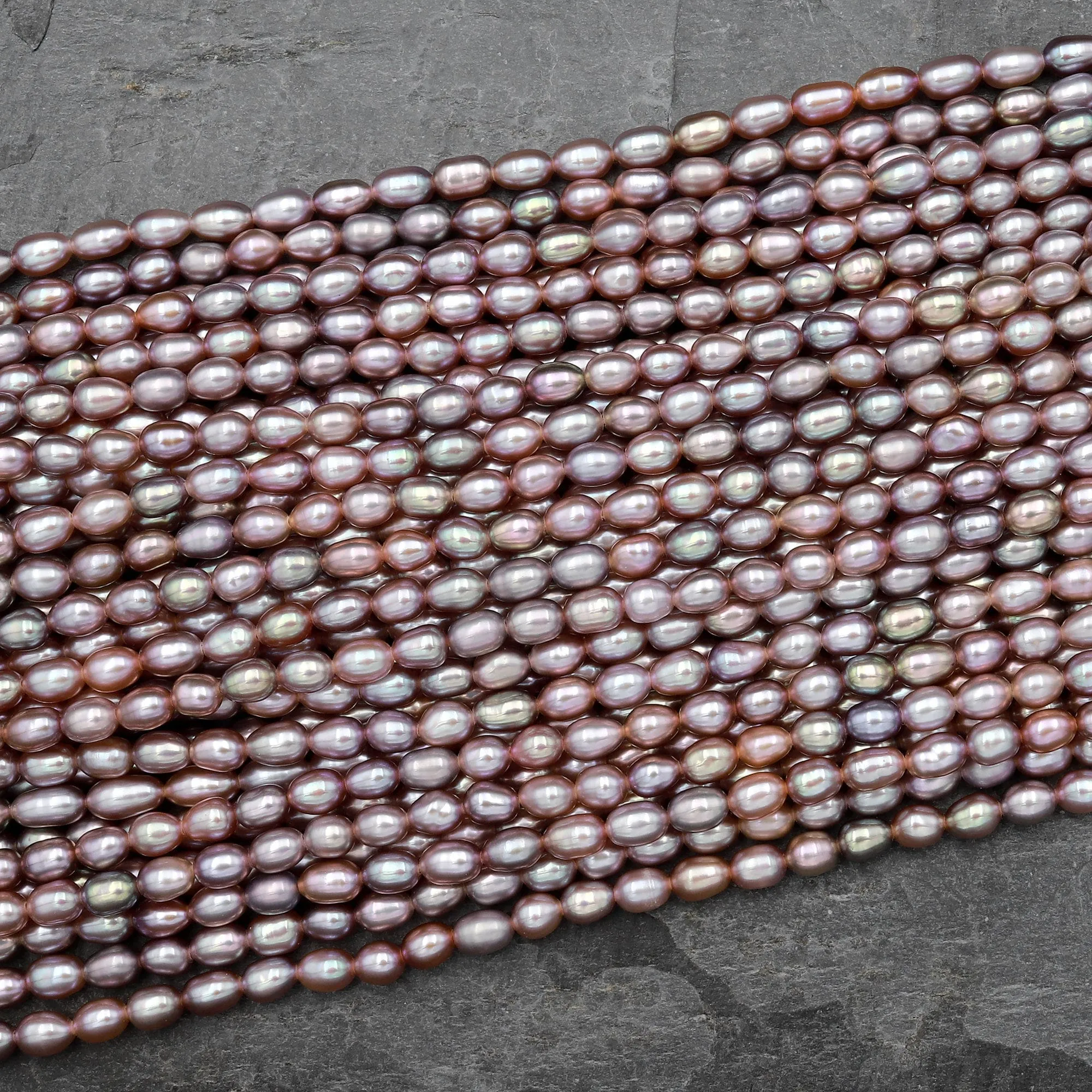 AAA Genuine Freshwater Natural Metallic Mauve Pink Purple Pearl Oval Rice Shape Iridescent High Luster Pearl 16" Strand